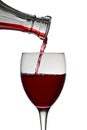 Red wine pouring down from a wine decanter Royalty Free Stock Photo