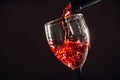 Red wine pouring glass Royalty Free Stock Photo