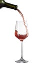 Red wine pouring into glass with splash isolated on white Royalty Free Stock Photo
