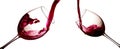 Red wine pouring in wineglasses on white background. Anniversary, Valentines or Christmas concept.