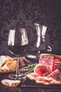 Red wine with prosciutto ham Royalty Free Stock Photo