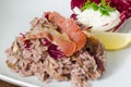 Red wine risotto with fried ham