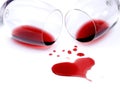 Red wine spilled on white background