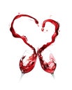 Red wine spilling and forming heart shape Royalty Free Stock Photo