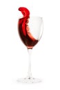 Wine splash into glass isolated with clipping path Royalty Free Stock Photo