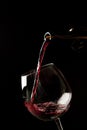 Red wine splash on a glass Royalty Free Stock Photo