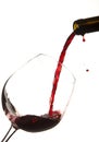 Red wine splash on a glass Royalty Free Stock Photo