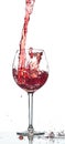 Red wine splash over white background Royalty Free Stock Photo