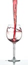 Red wine splash over white background Royalty Free Stock Photo