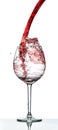 Red wine splash over white background Royalty Free Stock Photo