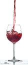 Red wine splash over white background Royalty Free Stock Photo