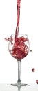 Red wine splash over white background Royalty Free Stock Photo