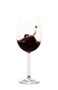 Red wine splashing in the glass Royalty Free Stock Photo