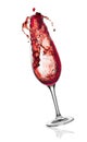 Red wine splashing from glass. Royalty Free Stock Photo