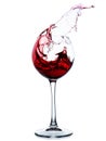 Red wine splashing in a glass Royalty Free Stock Photo