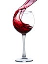 Red wine splashing in a glass Royalty Free Stock Photo