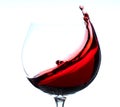 Red wine splashing in grass Royalty Free Stock Photo