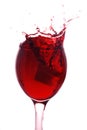 Red wine splashing out Royalty Free Stock Photo
