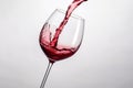 Red wine splashing out of a glass, isolated on white background - Ai Generated Royalty Free Stock Photo