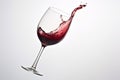 Red wine splashing out of a glass, isolated on white background - Ai Generated Royalty Free Stock Photo