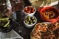 Red wine and tapas dishes on a wooden table Royalty Free Stock Photo