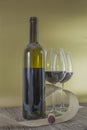 Red wine Theme_ single red wine bottle and two glasses Royalty Free Stock Photo