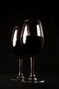 Red Wine. Two Glasses of Red Wine on Black Background Royalty Free Stock Photo