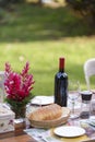 Red wine and whole wheat bread on dinner table