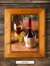 Red wine in a wooden frame Royalty Free Stock Photo
