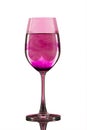 Red wineglass with potassium permanganate Royalty Free Stock Photo