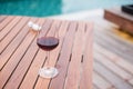 Red wines glasses near swimming pool. Summer travel, vacation, holiday and happy weekend concept