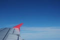 Red wing plane on blue sky Royalty Free Stock Photo