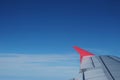 Red wing plane on blue sky Royalty Free Stock Photo