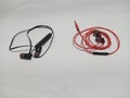 red wired earphones vs bluetooth earphones who is the winner Royalty Free Stock Photo