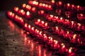 Red Wish Candles in a Christian Church