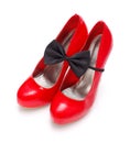 Red woman shoes with bow tie Royalty Free Stock Photo