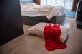 Red woman underware on bed room floor Royalty Free Stock Photo