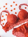 Red women underwear with lace isolated on white background. red bra and pantie.Copy space. Royalty Free Stock Photo