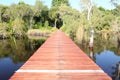 Red wood bridge reflection water Royalty Free Stock Photo