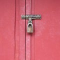 Wood gate with lock, locked wooden doors Royalty Free Stock Photo