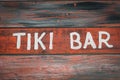 Red wood tiki bar sign