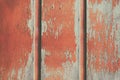 Red wooden background. Wooden background, painted surface of the old red boards. Weathered red wood texture close-up. Royalty Free Stock Photo