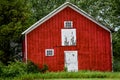 Red Wooden Barn with White Door Royalty Free Stock Photo