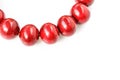 Red wooden beads isolated on a white Royalty Free Stock Photo