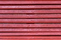 Red wooden bench close-up Royalty Free Stock Photo