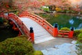 Red wooden bridge in autumn park, Autumn seaon Royalty Free Stock Photo