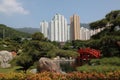 Red wooden bridge in Nan Lian garden in Hong Kong Royalty Free Stock Photo