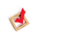 red wooden checkmark for voting on elections on a white background. Democracy and freedom. Presidency or parliamentary elections