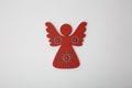 Red wooden christmas angel ornament on white Royalty Free Stock Photo