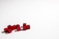 Red Wooden Game Cubes on left side of White Background